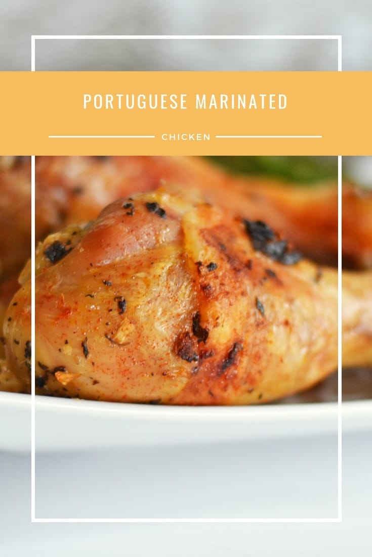Portuguese Marinated Chicken baked on a white plate. 