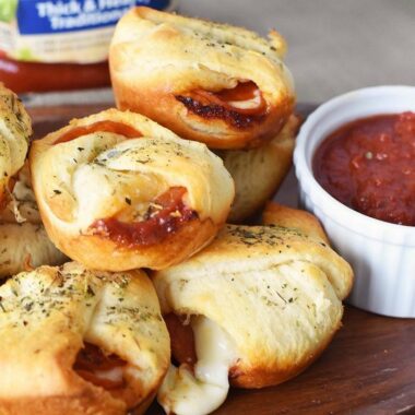 Pepperoni Pizza Bombs recipe on wood plate