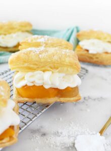 Peaches & Cream Pastries on a wire rack.