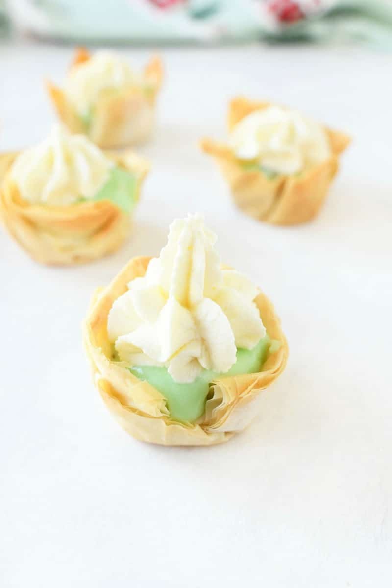 pistachio cream bites filled with pudding and whipped cream.