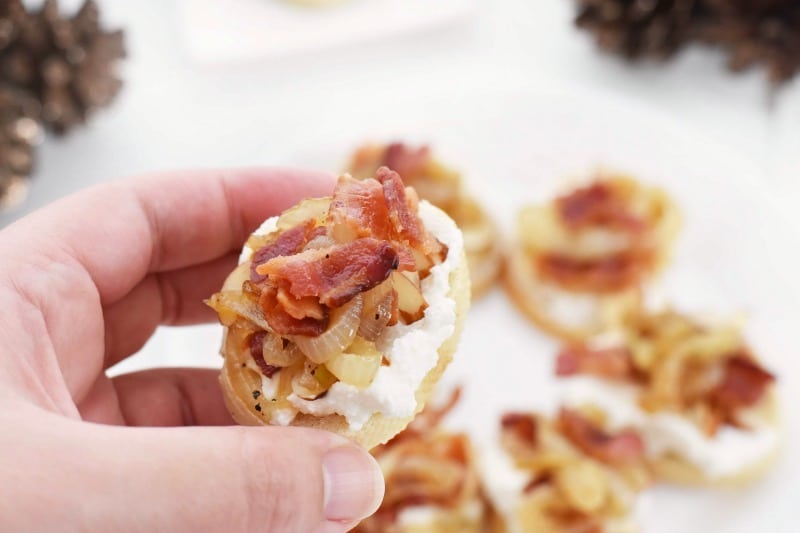 Caramelized Bacon Onion Bites in someone's hand. 