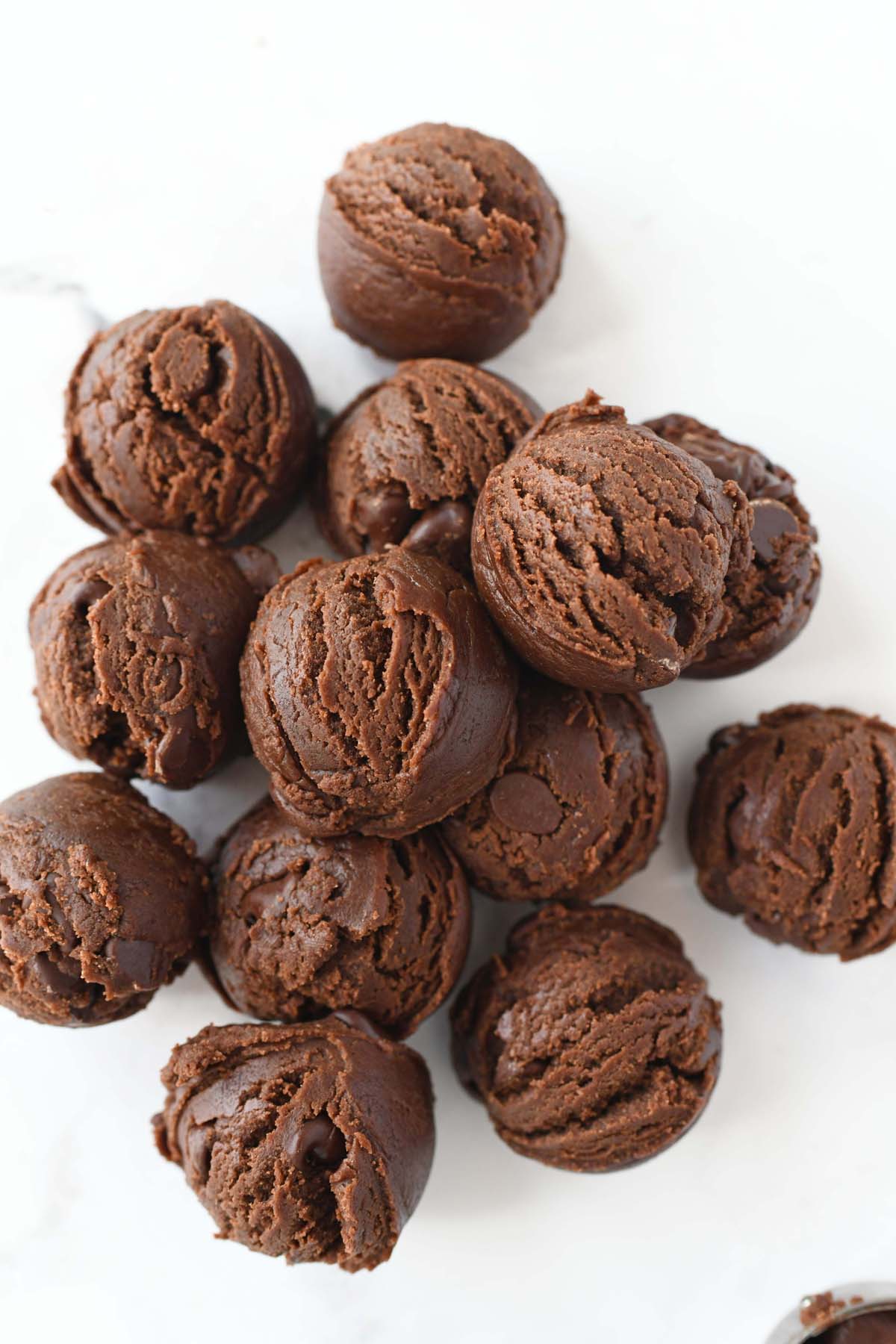 Scoops of chocolate brownie fudge cookie dough.