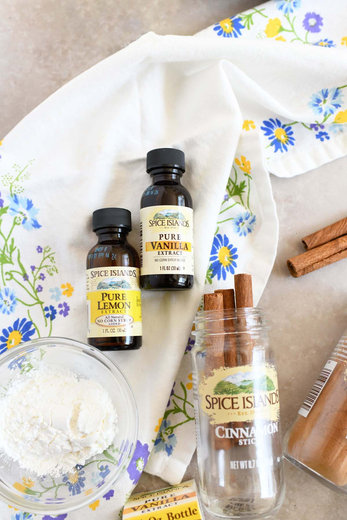 Spice Islands products on a white flowery napkin.