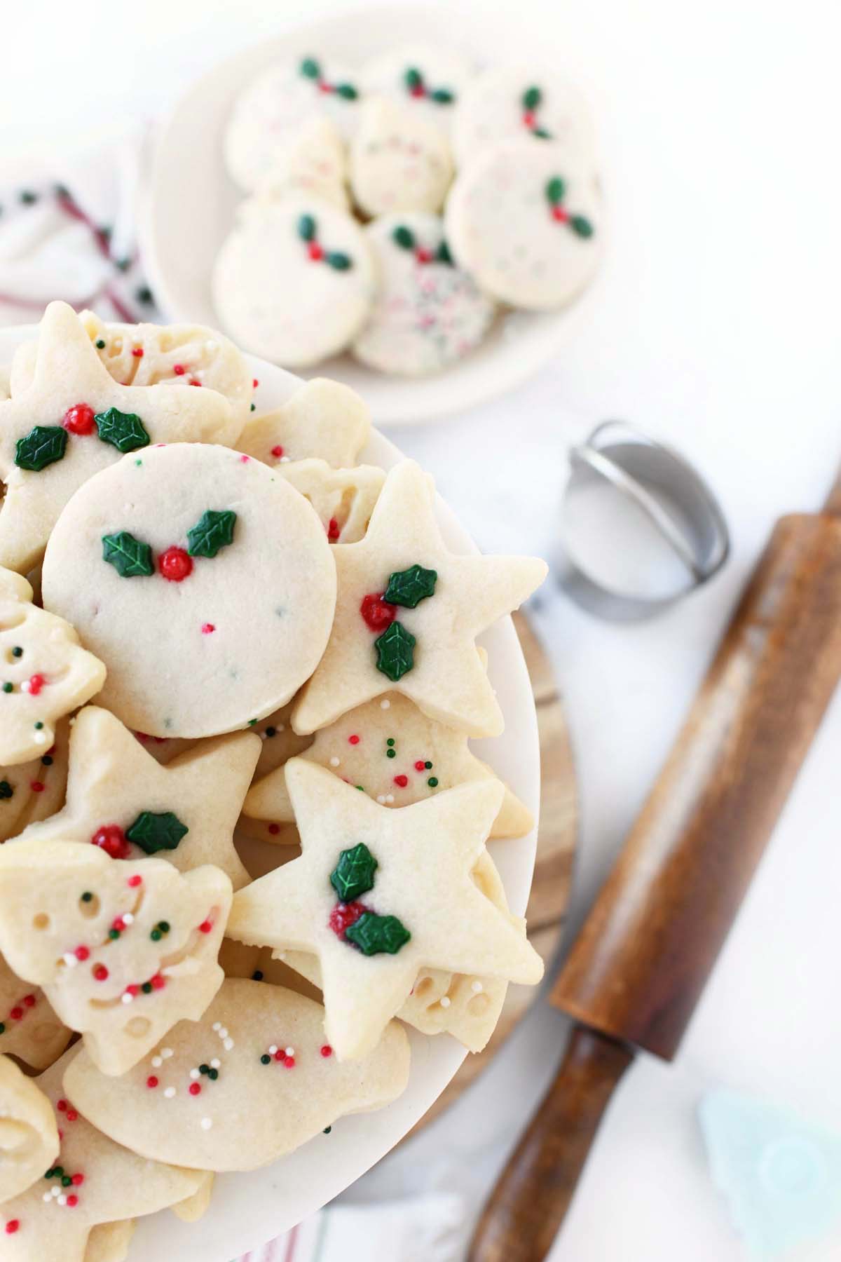 A plate of festive holiday cookie cutouts.